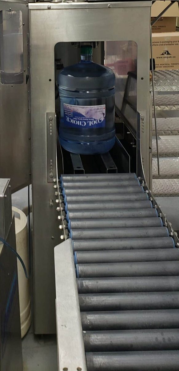 18.9 L Cool Choice jug on the 5-gallon filling line